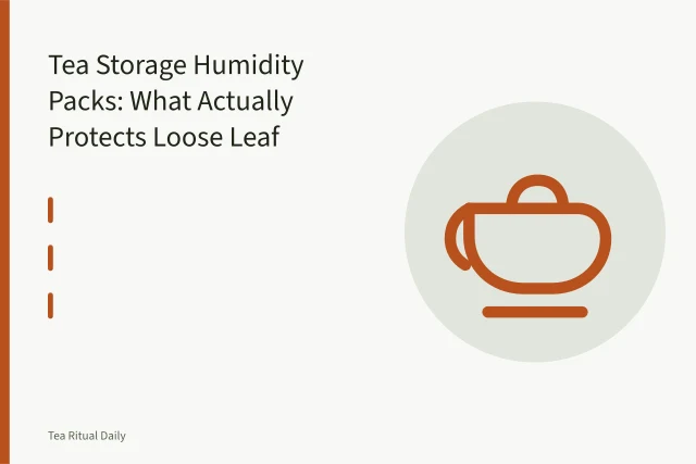 Two-way humidity pack in tea tin lid above loose leaf with digital hygrometer. Tea Storage Humidity Packs: What Actually Protects Loose Leaf