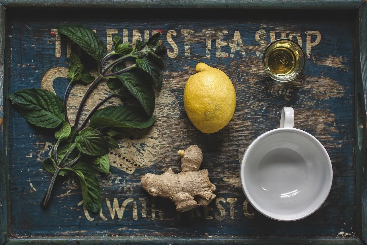 tea, honey, lemon, ginger, mint, above, tea cup, herb, herbal, drink, beverage, cup, hot, green, organic, healthy, mug, lifestyle. USDA Organic and Fair Trade USA labels on tea, what they verify