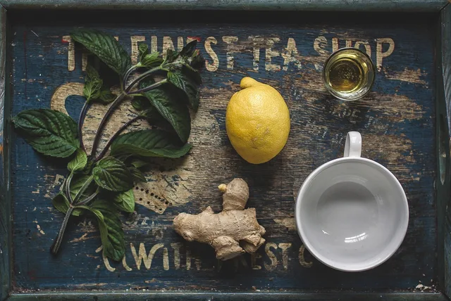 tea, honey, lemon, ginger, mint, above, tea cup, herb, herbal, drink, beverage, cup, hot, green, organic, healthy, mug, lifestyle. USDA Organic and Fair Trade USA labels on tea, what they verify